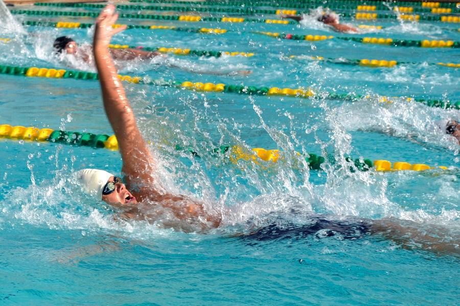 Sophomore Mika Kane fights his way toward the finish line in the boys 200 yard backstroke. Kane placed 6th in the event at the 2012 Hawaii High School Athletic Association swimming and diving state championship on Saturday, Feb. 11, 2012 at the Kihei Aquatic Center. Along with teammates seniors Keala Kama and Palani Hassett, and freshman Spencer Shiraishi, he also placed 8th in the boys 200 yard medley relay.