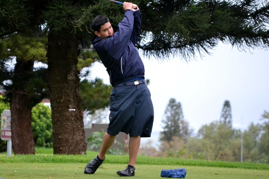 Senior golfer Kamuela Borge watches his golf ball slice through the air Kamehameha Schools Mauis golf match against King Kekaulike High School on Tuesday, March 6, 2012 at the Pukalani Golf Course. The KSM Warriors won against Na Alii of KKHS 167 to 194.