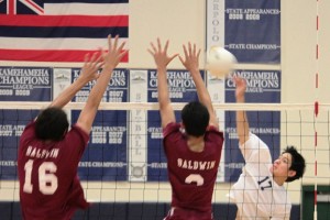 Junior Kawelau Yen hits the ball over the net at the KS gym on April 5, 2012 in a game against the Baldwin Bears. The Warriors lost three of the four sets, bringing them to 1-7 this season.