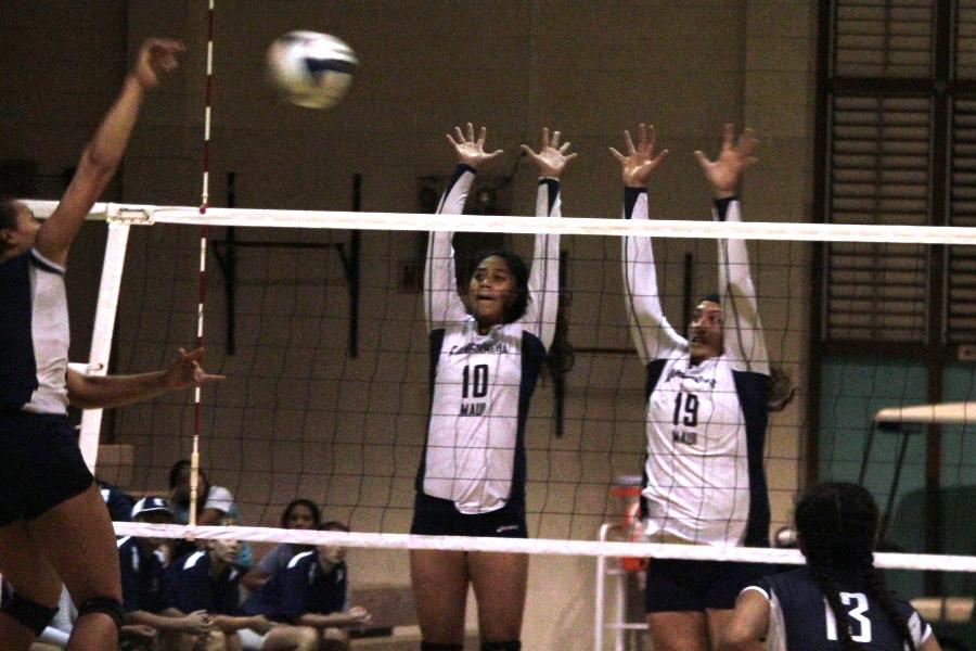 Sheylin Patao and Leimana Kane block a hit from KS Kapalama. The KSM Girls Volleyball lost all three sets to their sister team from Oʻahu on October 31, 2012 at the Kaimuki High School Gymnasium.