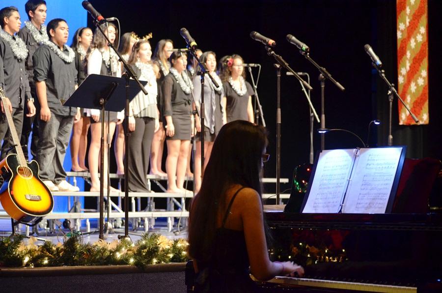 Kahea Arrietta accompanies the High School Chorus at the Christmas Concert in the song Carols, Rejoice! at Keōpualani Hale Dec. 13, 2012. 
