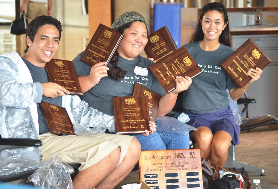 Editors Reid Cairme, Maya Nitta and Mehana Lee, hold their awards at the Honolulu Airport after the Hawaiʻi Publishers Association High School Journalism Awards on April 24, 2013. 