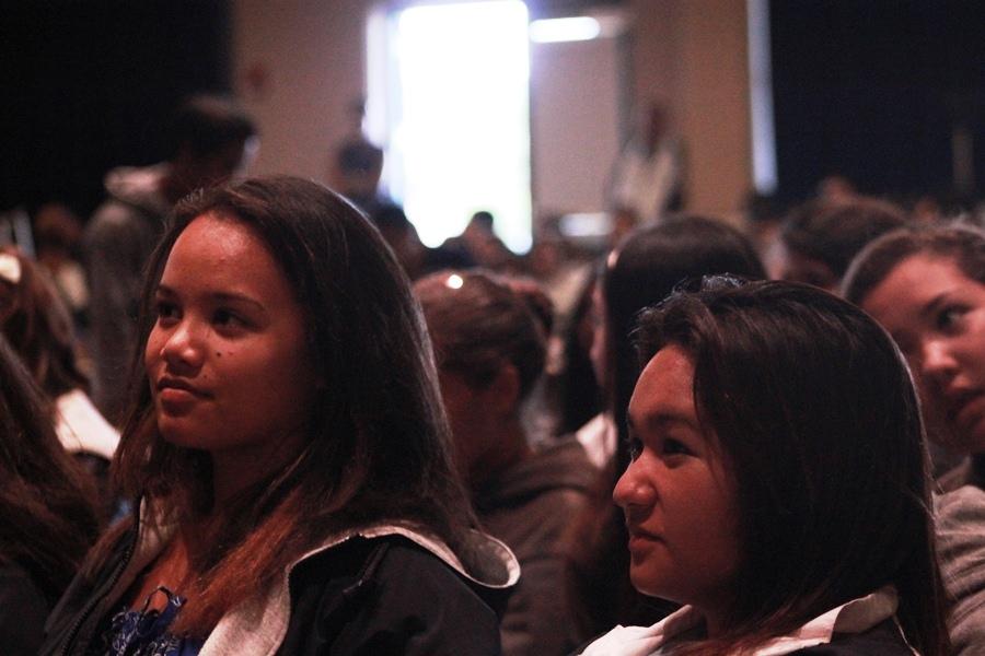 Among all the changes in store for this school year, some things remain the same, like a service by Kahu Kalani Wong. Sophomores Kahea Andrade and Mahie Kama listen to him at the convocation on the first day of school, August 5, 2013.