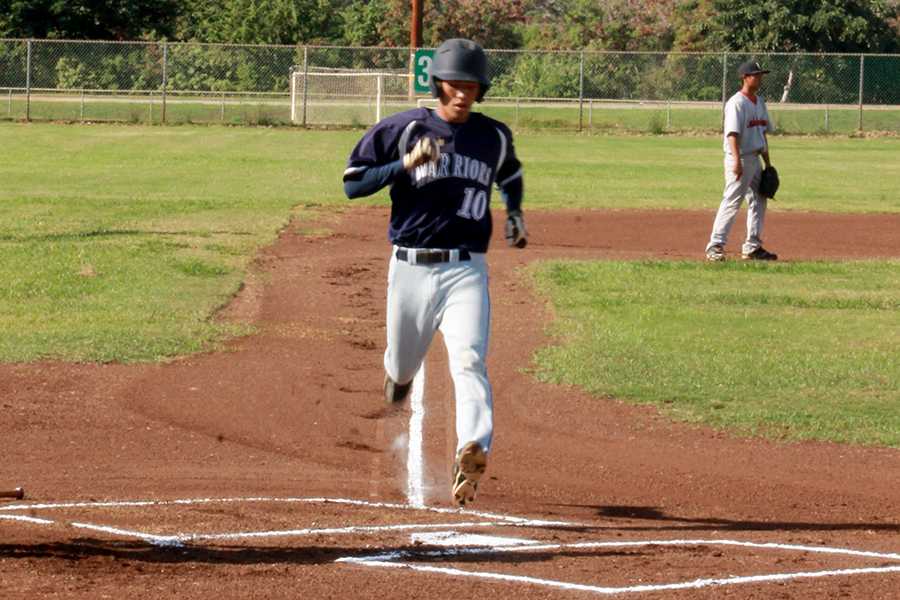 Sophomore, Kekoa Ostermiller scored the first run for the Warriors during their game against Lahainaluna on Thursday, January 30, 2014. The Lunas took the win with a score of 6-7.
