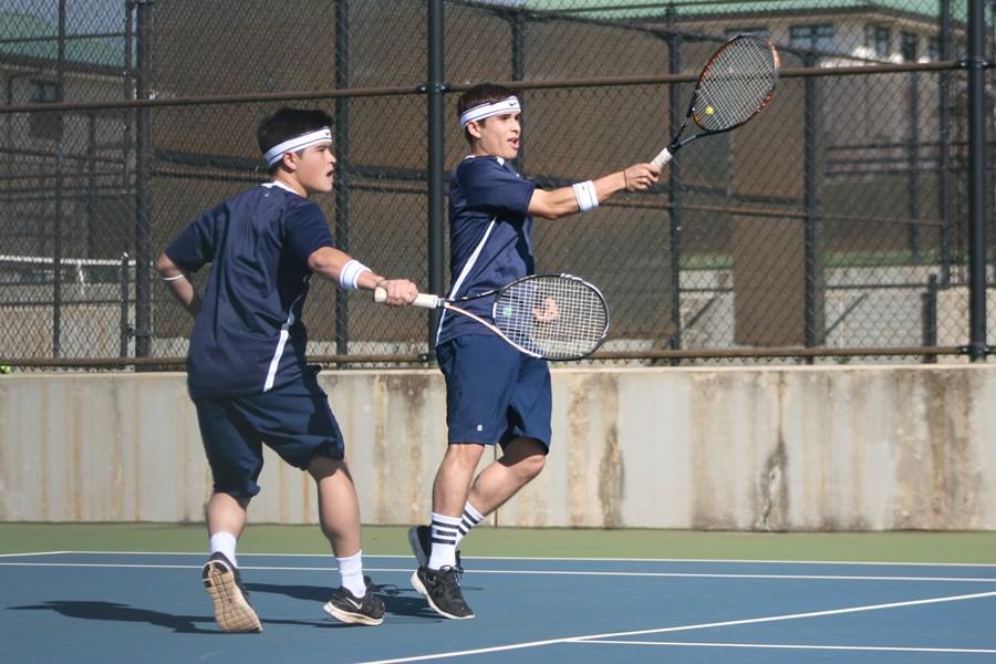The Alo Brothers, junior Micah (left) and senior Chandler (right) won their tennis match against Seabury Hall, 6-4, 3-6, and 7-6 at the Kamehameha courts on March 12.