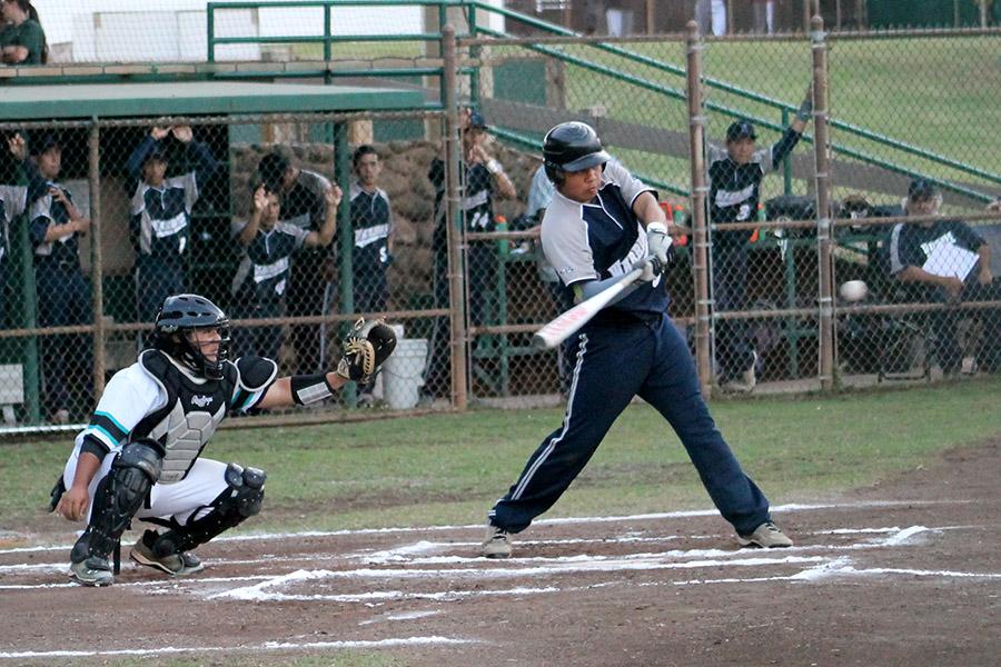 Junior Brennon Aloy hits a ball during the baseball game against King Kekaulike yesterday, March 20, at Maehara Stadium. Nā Aliʻi won, 12-5.