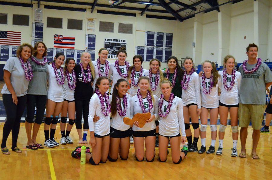 The+Lightning+of+Sage+Hill+High+School+hold+their+first+place+trophy+at+the+5th+Annual+Kamehameha+Maui+Volleyball+Invitational.+The+Newport+Beach+school%2C+defeated+Orange+County%2C+Calif.+neighbors%2C+the+Edison+High+School+Chargers+in+2+close+sets%2C+25-20+and+25-23%2C+August+16%2C+at+Kaulaheanuiokamoku+Gymnasium+in+Pukalani%2C+Hawaii.