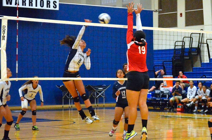 Junior Kaira Davis is back, firing one over the net at the first regular season girls volleyball match Sept. 2. The Warriors came on strong and shut out the Lunas 3-0 at Kaulaheanuiokamoku. It was the first Warrior win for the MIL season.