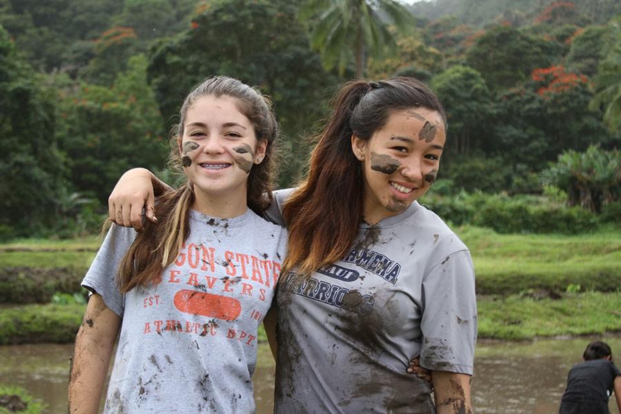 Sophomores+Te%CA%BBa+Monden+and+U%CA%BBilani+Gibbs+pose+for+a+photo+at+the+lo%CA%BBi+after+a+mud+fight.