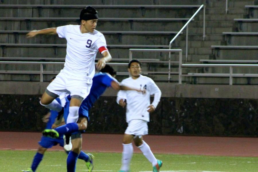 Bryant Kubo jumps for a header. Bryson Funai is ready to back him. The cohesive Maui Warriors held onto their lead in the MIL with a 6-0 win over the Maui High Sabers January 23 at Kanaʻiaupuni Stadium.