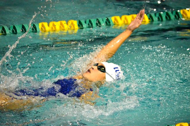 Senior Kristian Rosete swims in the 100-yd backstroke during the MIL Championship Trials on Friday, January 6. One swimmer qualified for the HHSAA tournament, three made consideration times, and six will be returning for the finals today, February 7 in Kīhei.