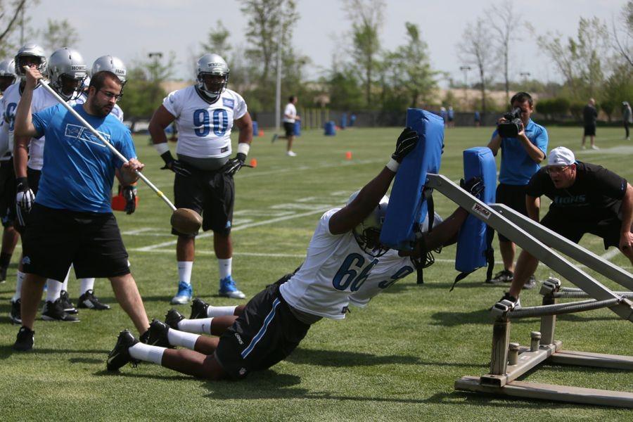 Defensive linemen go through drills during the Detroit Lions rookie mini camp at the teams Allen Park, Mich., practice facility on May 8, 2015. (Kirthmon F. Dozier/Detroit Free Press/TNS)