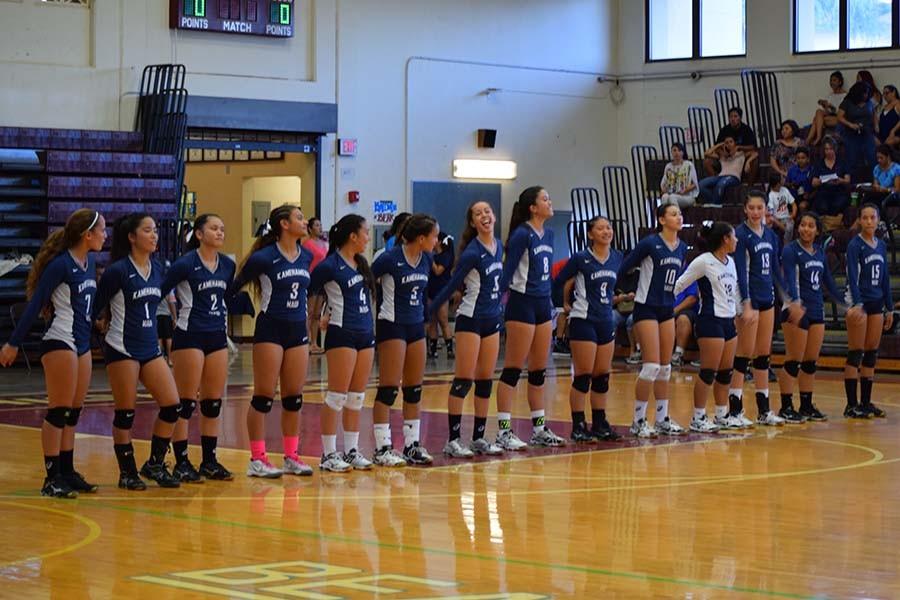 The+Kamehameha+girls+volleyball+team+lines+up+to+greet+the+other+team+at+their+match+against+Baldwin+on+Friday%2C+August+28.