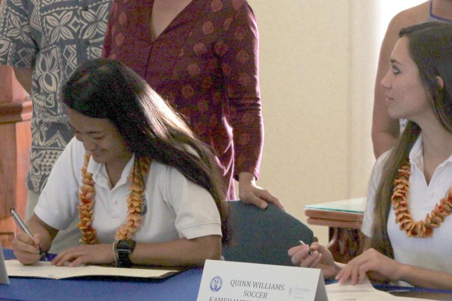 Sarah+Ikioka+and+Quinn+Williams+sign+their+Letters+of+Intent+at+the+Charles+Reed+Bishop+Learning+Center+on+Wednesday%2C+February+3.+Ikioka+will+be+playing+tennis+at+the+University+of+Redlands%2C+and+Williams+will+be+playing+soccer+at+Concordia+University+in+Portland.