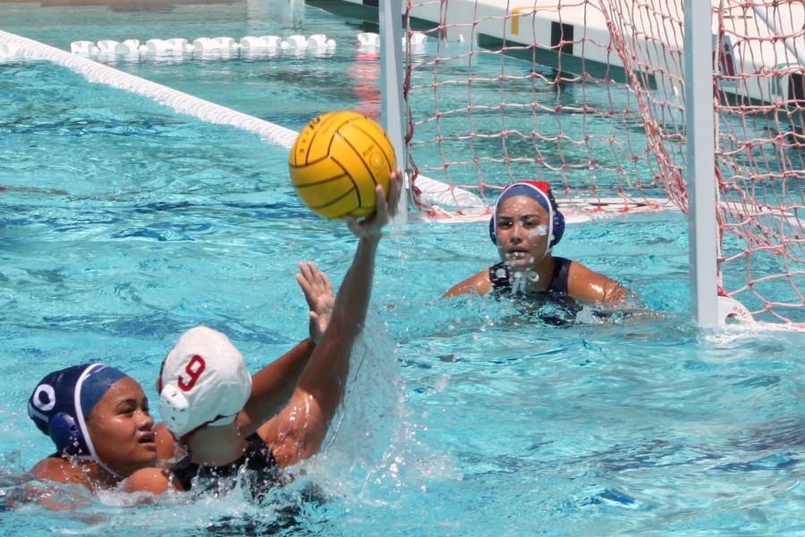 Victoria Ngalu reaches to block a Luna on Saturday, April 2, at Piilani Pool. Lahainaluna won and remained undefeated this season.