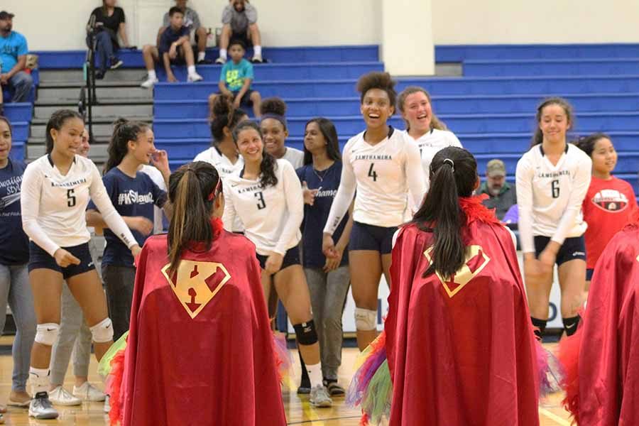 Underclass+girls+volleyball+dances+before+senior+teammates+after+their+senior+night+game+on+Tuesday%2C+Oct.+4.+The+Warriors+were+defeated+by+King+Kekaulike%2C+3-0.