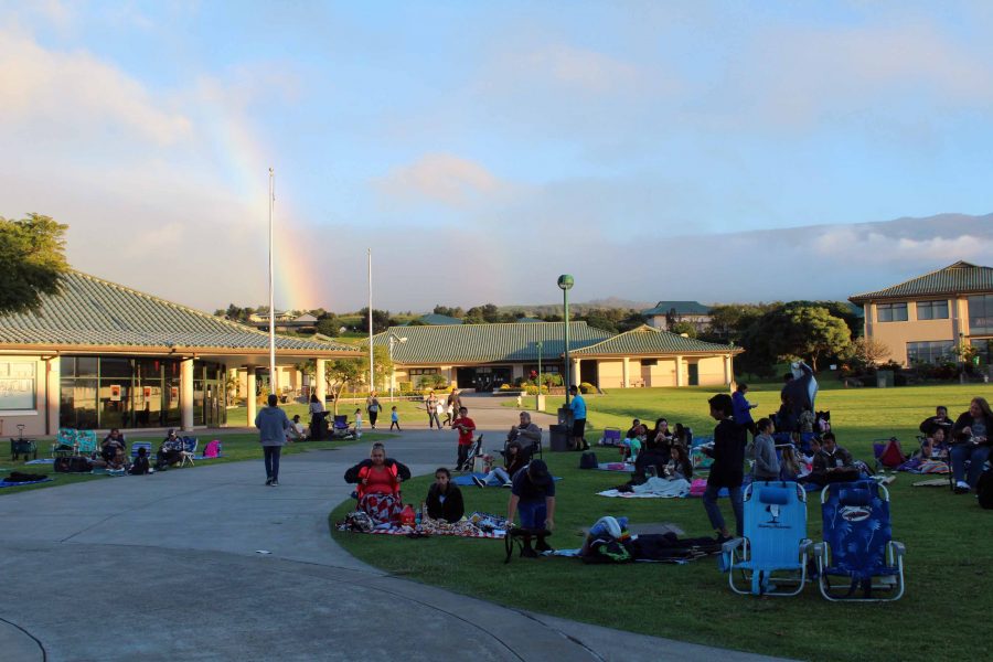 Families and friends lay out their blankets and chairs for the all-school movie night hosted by the PTSO. The event took place outside Keʻeaumokupāpaʻiaheahe on Saturday, Jan. 28.