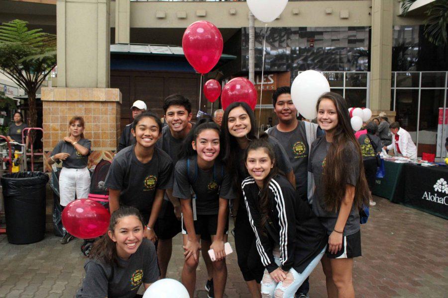 Eight juniors and two adults walked in the Family Care Giver event to support Analis Nitta in her senior project at Queen Kaahumanu Center on Feb. 25, 2017. The Warriors are all smiles while waiting for the walk to begin.