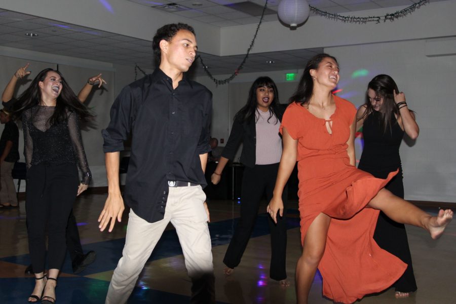 The senior classs Kamehamehas Best Dance Crew re-preform their step routine for their classmates and guests at their last formal, the senior ball, Saturday, March 11 at Kuakini Dining Hall.