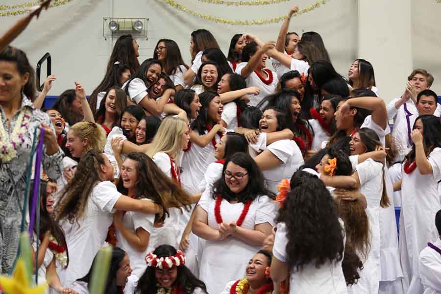 The senior girls celebrate when they receive Ka Maka o ka Ihe after winning ʻAha Mele with 100.5 points.