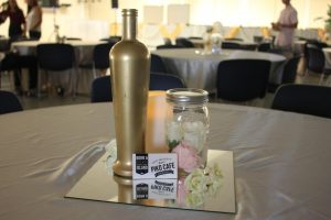 Tables were decorated with pastel colored vases with roses and scattered with Piko Cafe coupons.