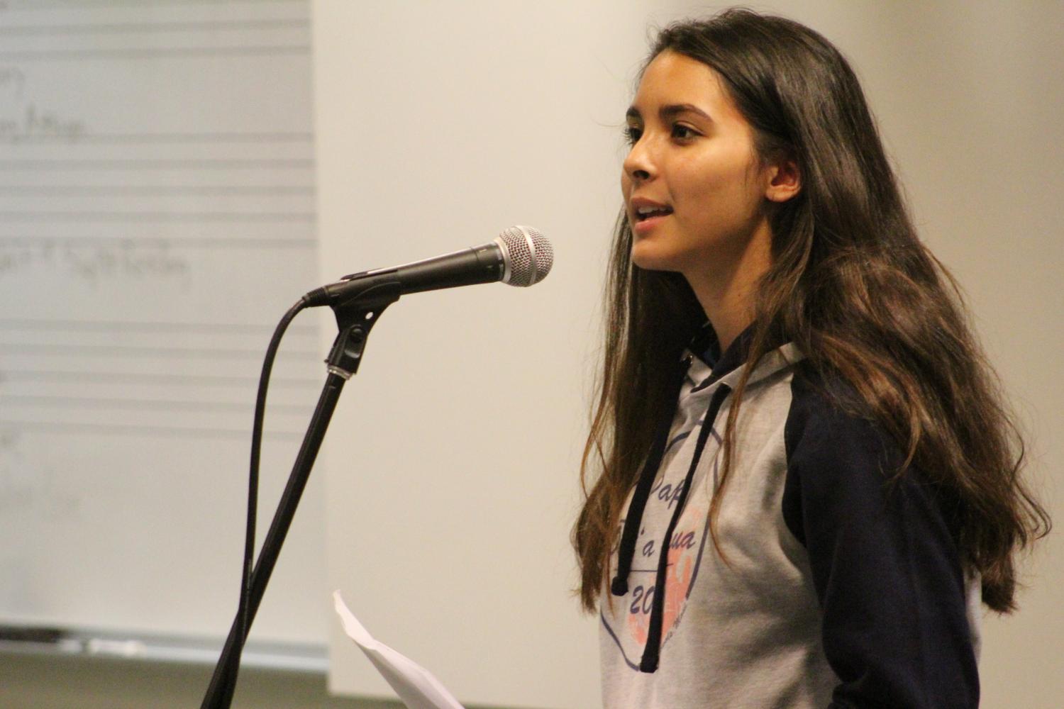 Senior Mariana Kaniho reads her writing at We Digress...Live! Family and friends were welcomed to come and watch the live readings of the Creative Writing I students.