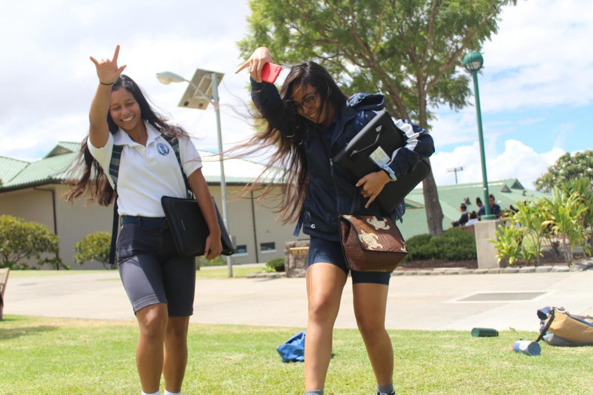 Seniors Inez Garcia and Mākena Pang skank in the quad at lunchtime, Monday. The Associated Students of Kamehameha Maui has announced plans to host both small and large events at lunch to promote school spirit.