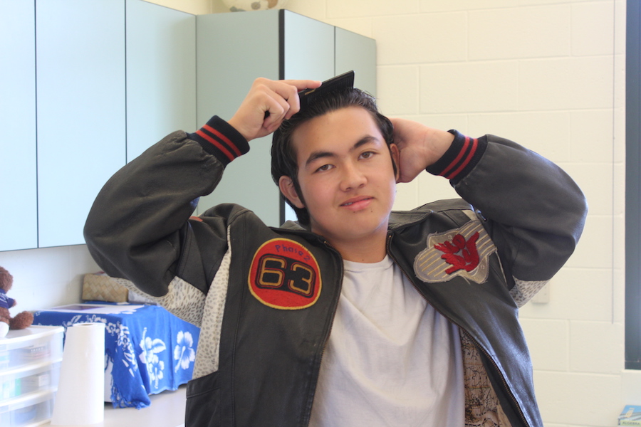 Junior Nathan Ramos combs back his hair to get that 50s style on Monday, Sept. 11. Kamehameha Maui students dressed in costumes all week long to celebrate spirit week leading up to the homecoming game on Friday.