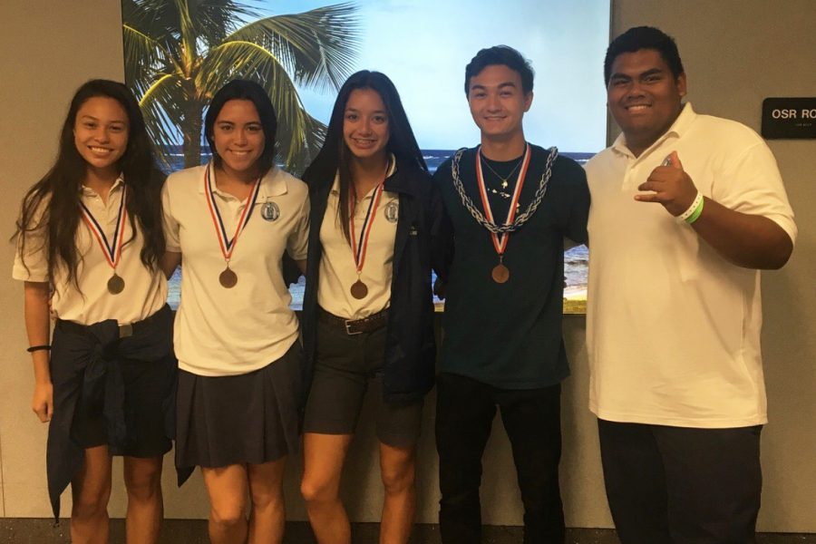Juniors Keely Logan, Kiana Over, freshman Teija Tuitele, and seniors Hunter Worth and Micah Au-Haupu bring home medals from the 2018 HHSAA track and field competition.