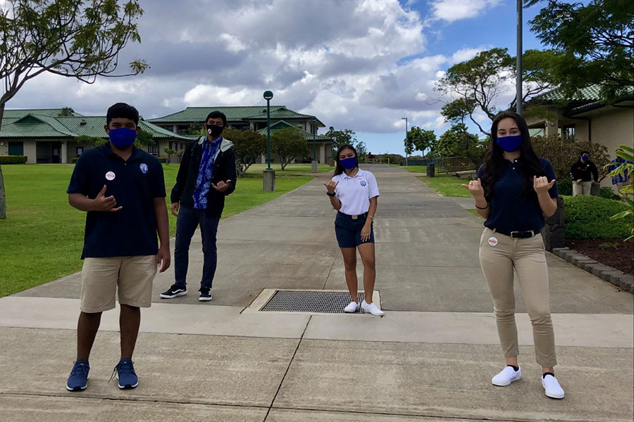 Seniors Hinano Lovell, Kiha Kahalehau, Savannah Rose Dagupion, and Teilana Akre show how to properly distance socially on their first day back to school, October 19, two months after the official start of school.