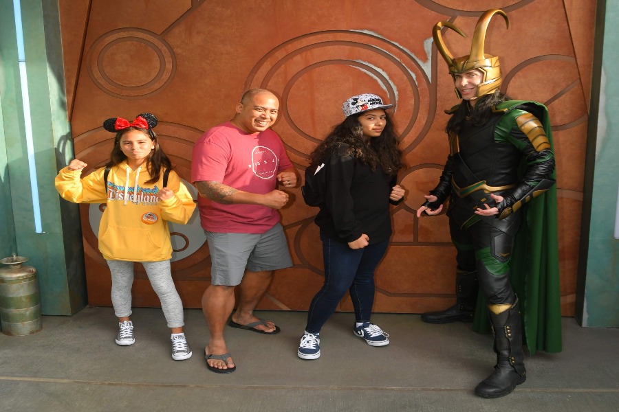 Im a die-hard Marvel fan. Heres me, my family and Loki at Disneyland.