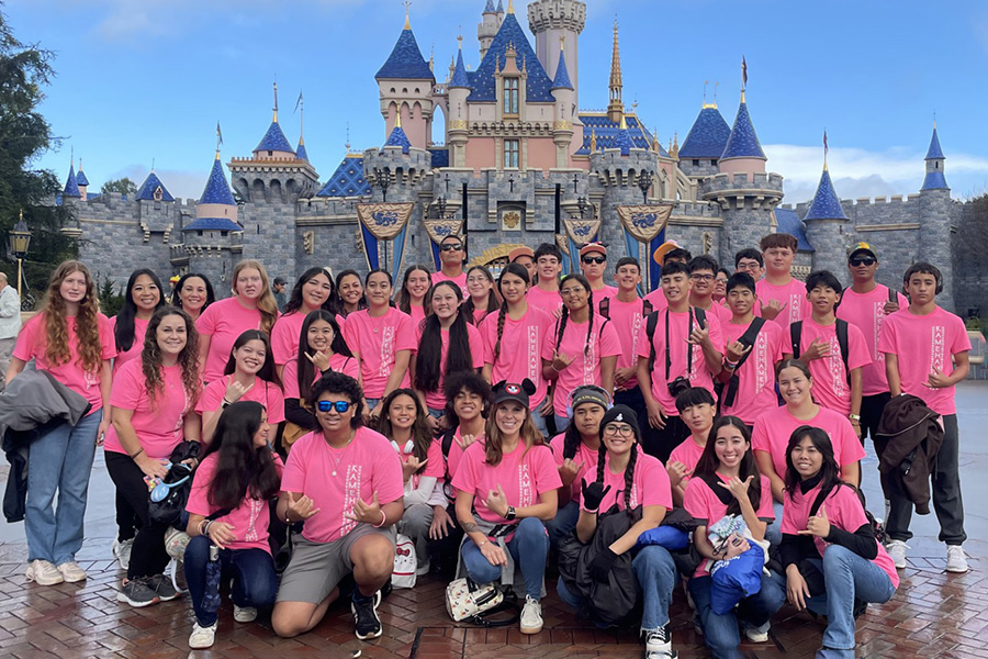 The Kamehameha Schools Concert Band visits Disneyland on a rainy day after learning about making music soundtracks at Disney's Instrumental Music Workshop in Anaheim, California last week.